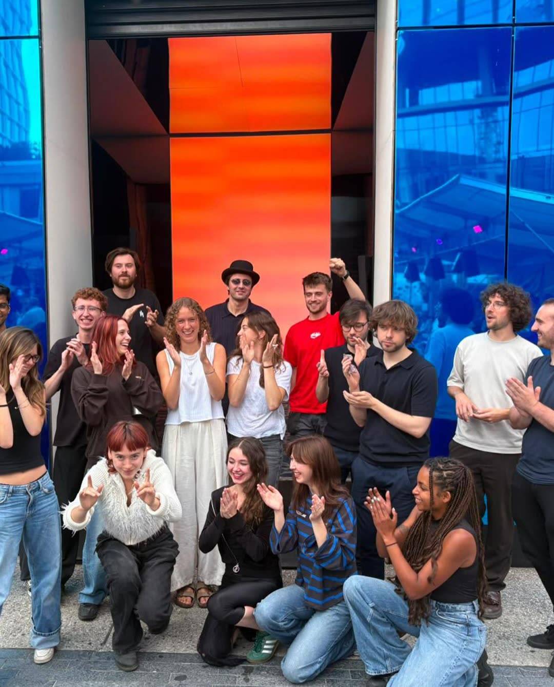 The Prodigy12 team in front of the blue cube