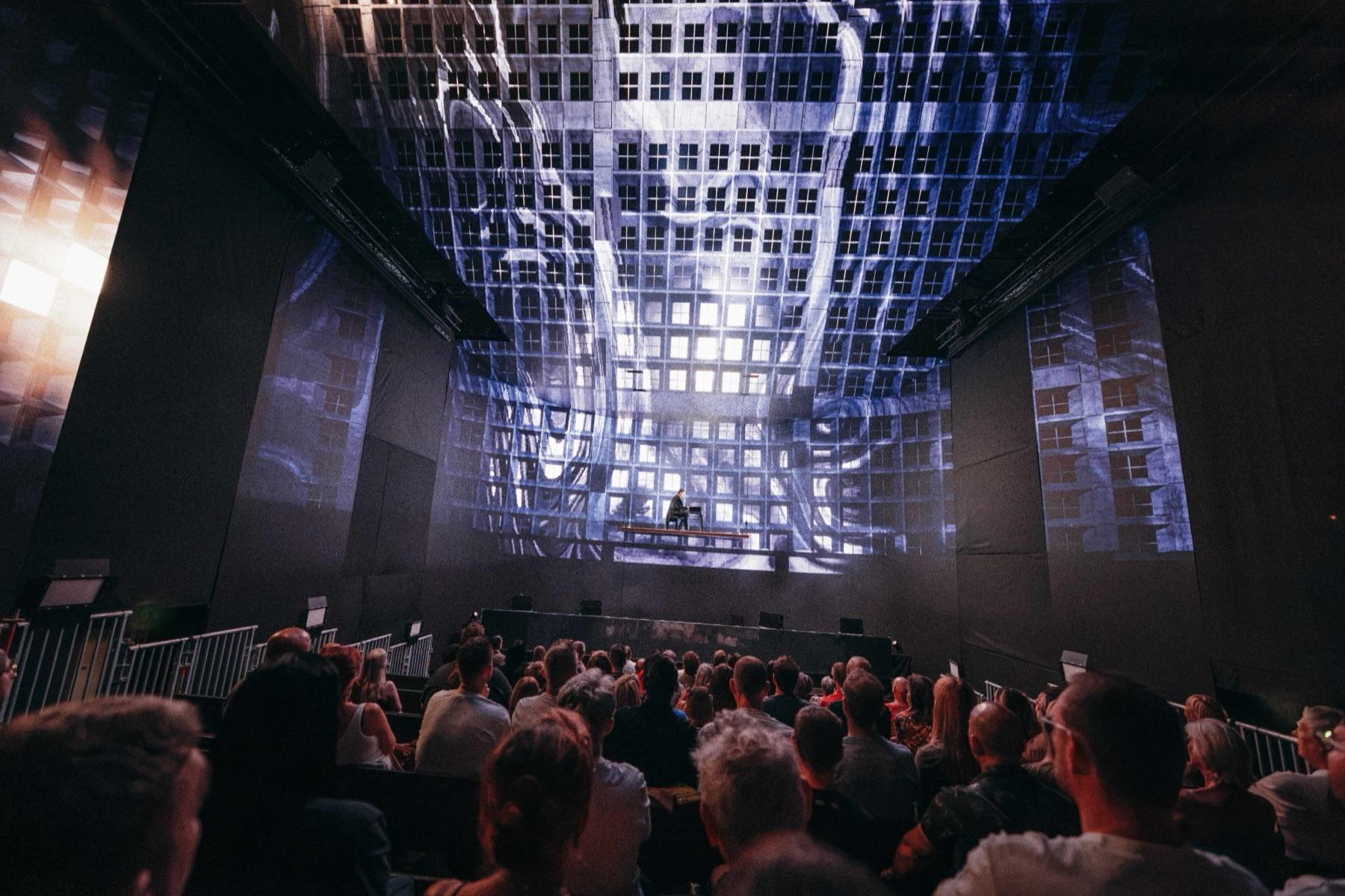 The audience under the LED walls during a Prodigy12 show